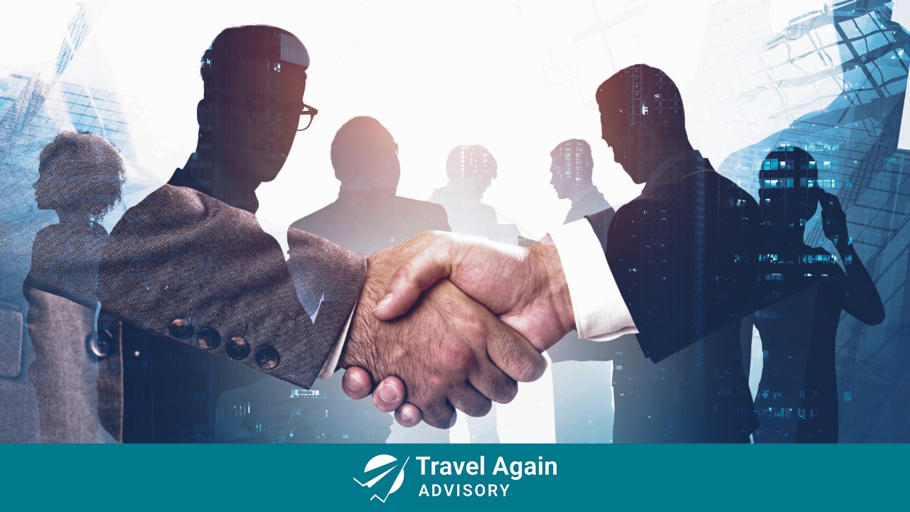 A handshake that indicates a successful corporate sale.