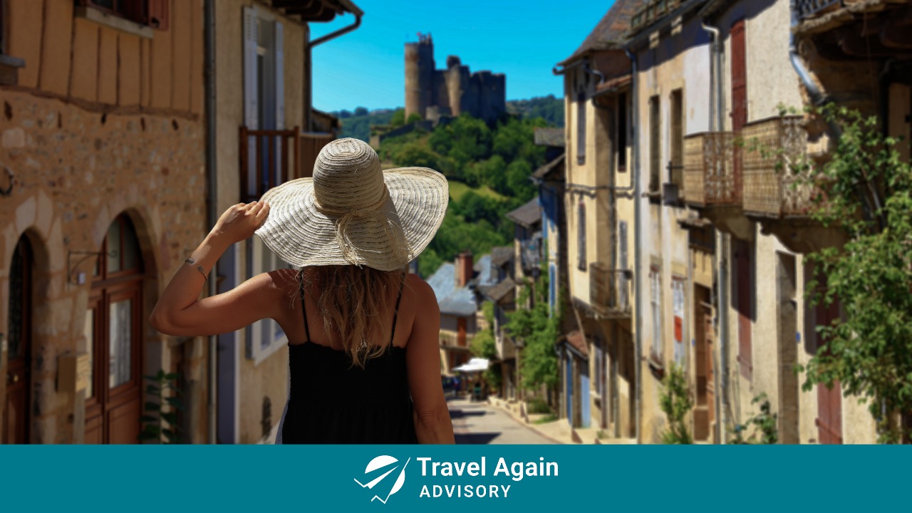 A woman enjoying the experience of the culture of the place she traveled to.